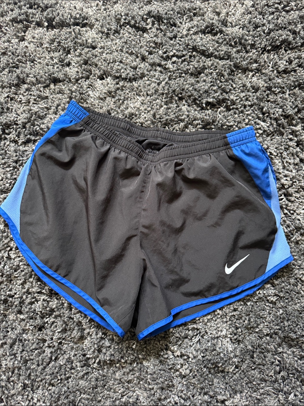 Nike Women's Black Shorts with Royal Blue Trim and Side Panels